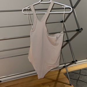 Never worn body suit